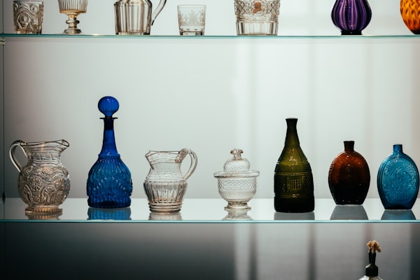 Collection of antique glass vessels representing the Dorflinger Factory Museum
